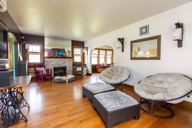 Original hardwood floors, beautiful wood trim, ope