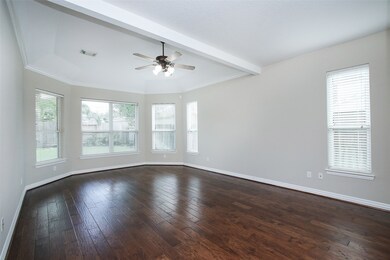 The primary bedroom with sitting area can easily accommodate a king size bedroom suite.