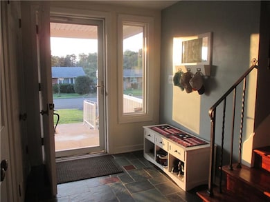 Enter off of covered front porch to a spacious sla