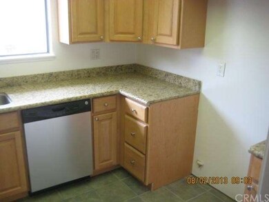 Remodeled kitchen with stainless steel appliances.