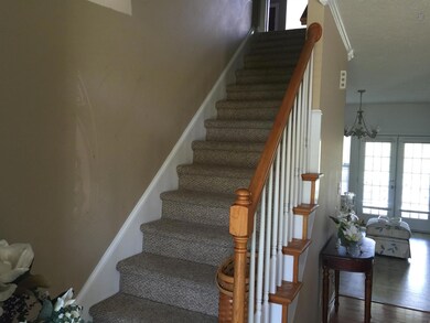 Nice staircase with wooden spindles.