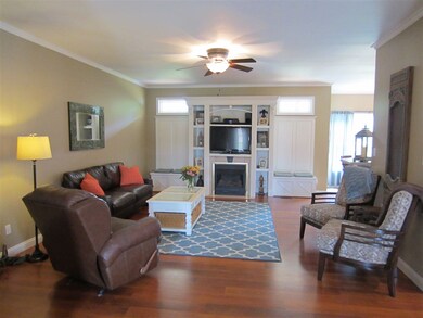 The Living Room has attractive wood laminate floor