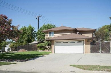 Spacious corner lot with mature landscaping and RV