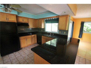 Newer wood cabinets w/granite countertop