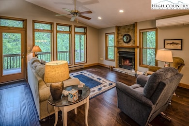   LVP flooring with propane fireplace.