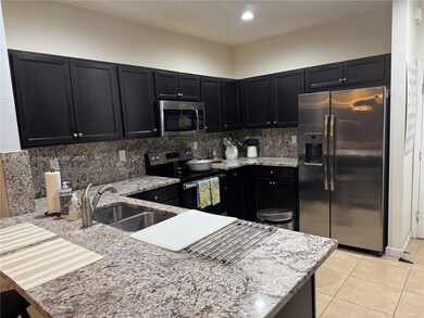 Spacious modern open kitchen w/ss appliances!