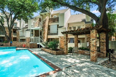 View of swimming pool featuring a pergola and a pa