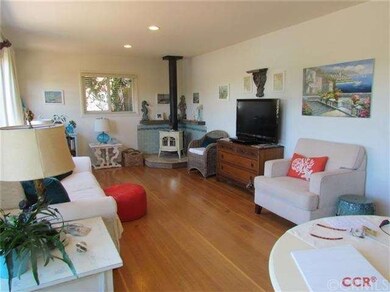 Main House living room with Dual pane Windows and 