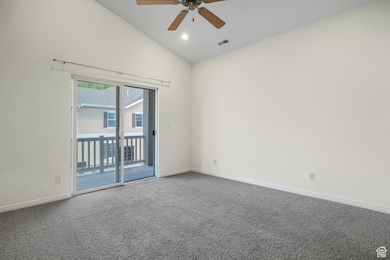 Unfurnished room with carpet flooring, recessed lighting, a ceiling fan, and high vaulted ceiling