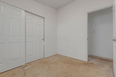 First bedroom as seen from windowside without furn