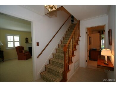 Entrance hall has cased openings to living room an