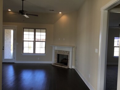 Large open Family room lead to covered back patio 