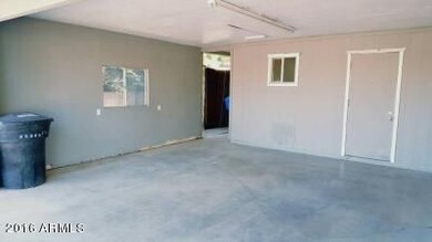 Covered garage driveway, view 2