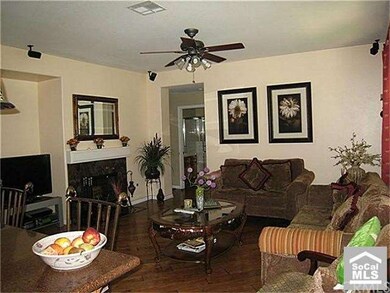 Family room with fireplace and entertainment media