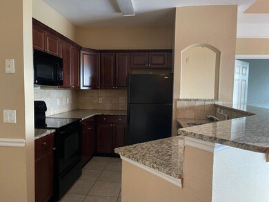 6412 Queens Borough Ave unit 310, Orlando, FL 32835 - photo 3
