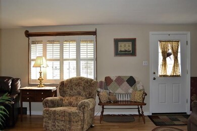 Living Room.  New plantation shutters were added t