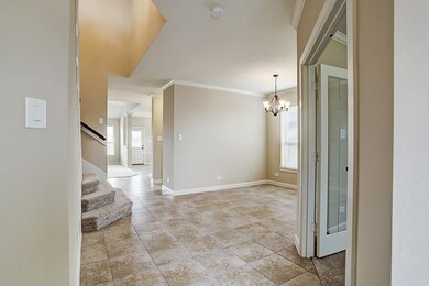 Dining room is open to the entry hall. This floorplan flows graciously from one room to another. There is also a large closet under the staircase.