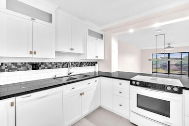 4930 E Sabal Palm Blvd unit 414, Tamarac, FL 33319 - photo 7