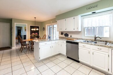 Large kitchen with ceramic flooring