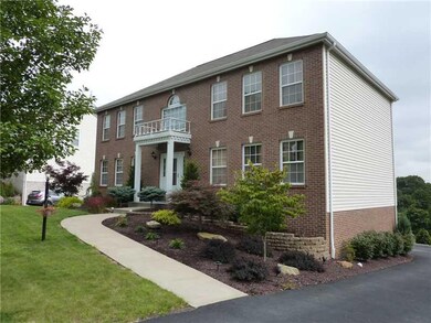 Exterior Front. This nicely landscaped home with c