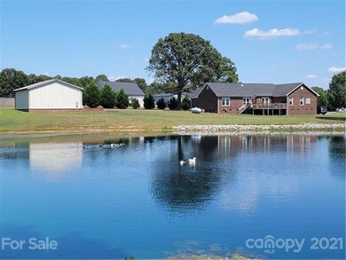 What size does a pond turn into a lake?