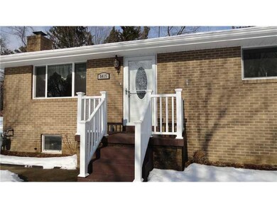 Exterior Front. Leaded glass front door, snow is h