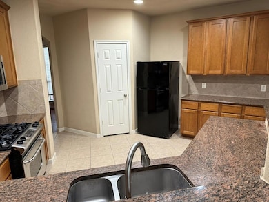Kitchen featuring stainless steel appliances, dec