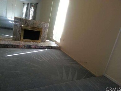 sitting area with marble fireplace