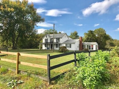 Beautiful treed and partially fenced yard. Front p