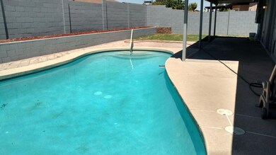 Block wall surrounding the pool area