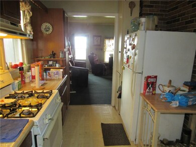 View of kitchen from back door looking towards the