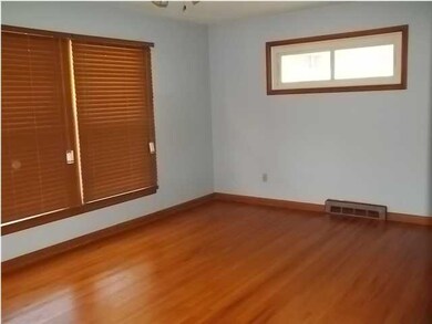 Large Living Room with Beautiful Hardwood Floors.
