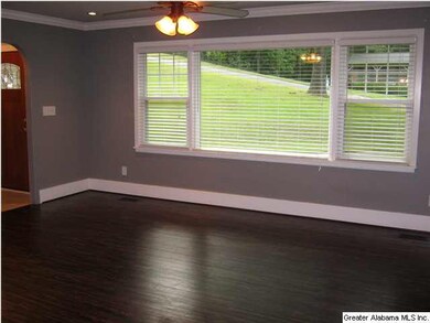 Spacious great room with large window overlooking 