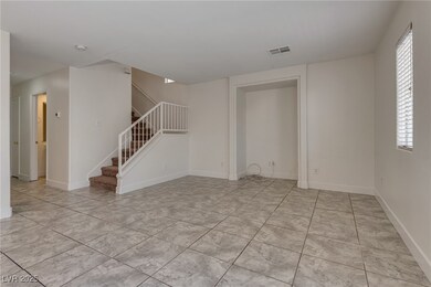 Spare room with stairway, plenty of natural light,