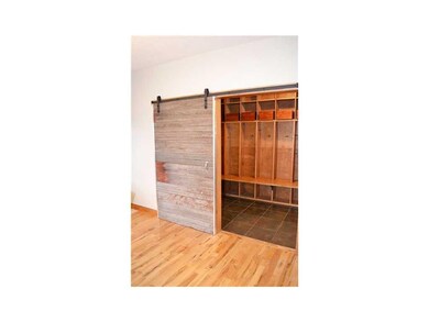 Kitchen. New barn door that leads to drop zone