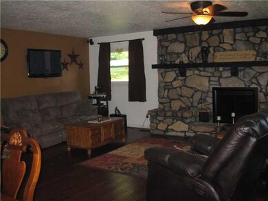 Living Room. Notice the Hardwood Flooring.