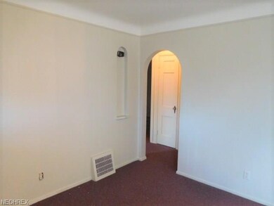 Entry to full bath, 2 bedrooms down and stairs to the 2 bedrooms up.