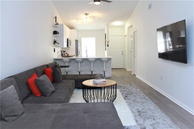 Open floor plan with vaulted ceiling.