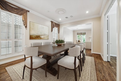 The Dining Room is positioned next to the Kitchen and opens to the Family Room.