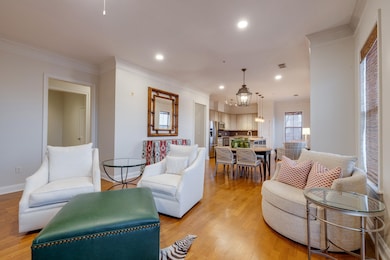 Living room featuring light wood-type flooring and
