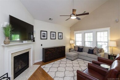 Great Room has fireplace and vaulted ceilings!!