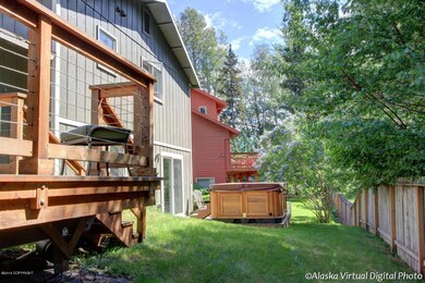 Deck and patio with hot tub