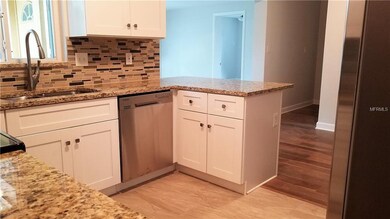 Kitchen open to dining area and bonus room