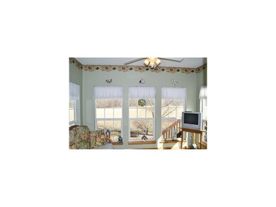 Sun Room. 4 seasons room connected to deck