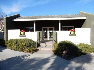 Clubhouse overlooks sparkling community pool and s