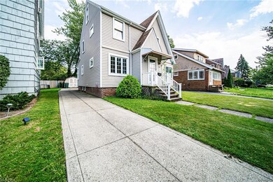 View of front of house with a front yard