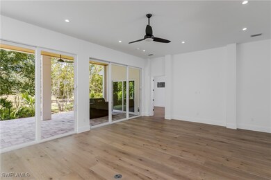 Unfurnished room with hardwood / wood-style floors