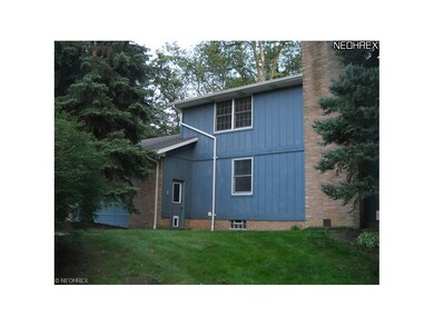 view of side of home and garage