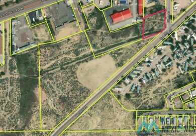 Aerial map of property and surrounding area featuring property parcel outlined