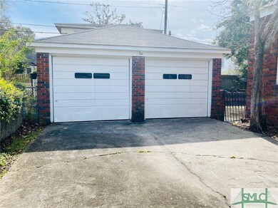 Coveted brick 2 car garage.